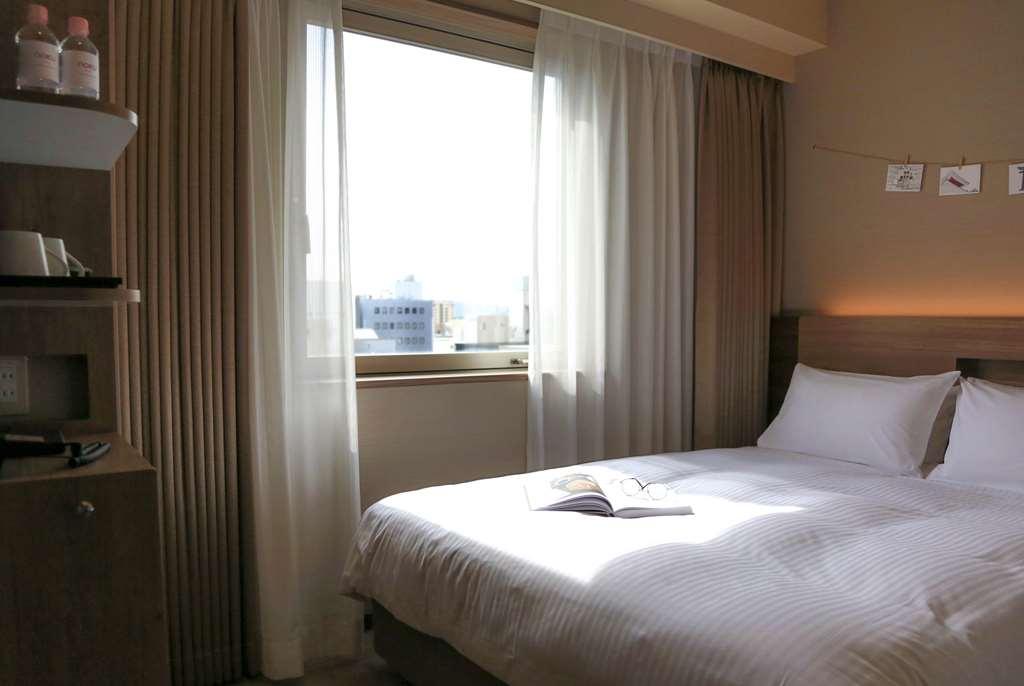 Noku Osaka Hotell Rum bild